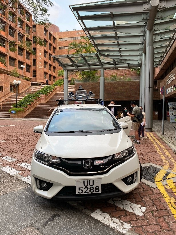 IPNL testing vehicle outside PolyU